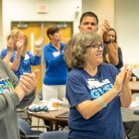Alumni clapping at the Alumni Leadership Summit.